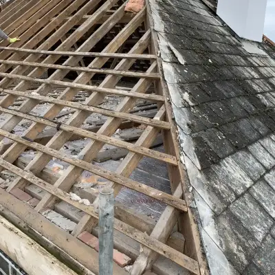 Photo of Property Roof Being Stripped Ready For Felt and Battening